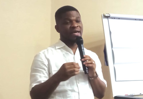  Sammy Gyamfi (Inset), acting Managing Director, PMMC, addressing participants in the event