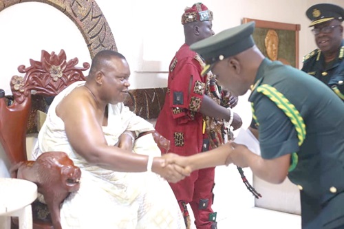 Samuel Basentale Amadu (right), Comptroller-General of the Ghana Immigration Service, being welcomed to the Gbese Mantse Palace by Nii Ayi Bonte II