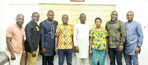 George Abradu-Otoo (4th from left) with the officials and management of NAFCO after the meeting