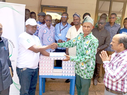 Professor Samuel Kaba Akoriyea (left), the acting Director-General of the Ghana Health Service, presenting the medicines to Dr Abdulai Abukari, Northern Regional Health Director