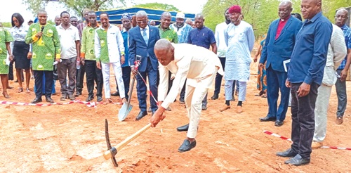 Yussif Sulemana, Deputy Minister of­ Lands and Natural Resources, cutting the sod for work to begin on the new office complex