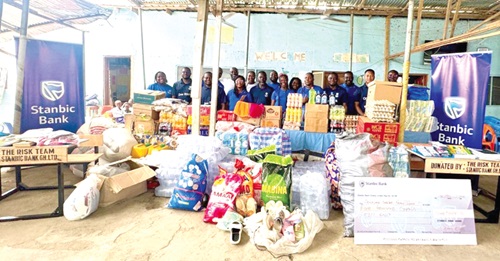 The Risk Team, Stanbic Bank Ghana, with the items donated to the Graceland Childcare School