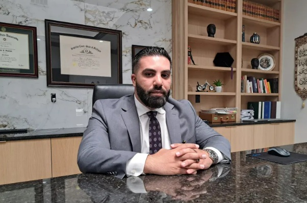 Lawyer Amir Makled worried that handing over his phone at a US border checkpoint would violate attorney-client privilege [Stephen Starr/Al Jazeera]