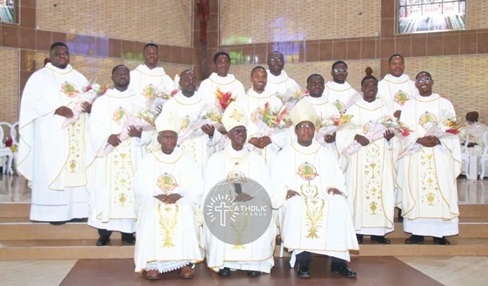 Archbishop John Bonaventure Kwofie (middle), Metropolitan Archbishop of Accra, with the newly ordained Catholic priests. With him are Most Rev. John Kobina Louis (right), Auxiliary Bishop of Accra, and Most Rev. Anthony Narh Asare (left), Auxiliary Bishop of Accra Archbishop John Bonaventure Kwofie (middle), Metropolitan Archbishop of Accra, with the newly ordained Catholic priests. With him are Most Rev. John Kobina Louis (right), Auxiliary Bishop of Accra, and Most Rev. Anthony Narh Asare (left), Auxiliary Bishop of Accra