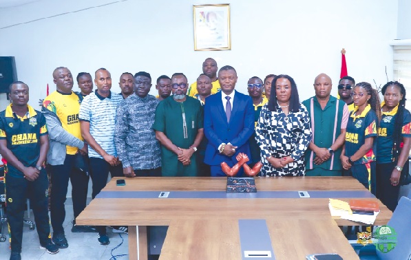 • Kofi Adams (arrowed), Minister for Sports and Recreation, with the GAF Leadership and members of the Golden Arms • Kofi Adams (arrowed), Minister for Sports and Recreation, with the GAF Leadership and members of the Golden Arms