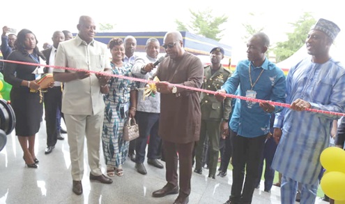 President John Dramani Mahama (middle) being assisted by Joseph Bukari Nikpe (left), Minister of Transport; Rev. Stephen Wilfred Arthur (2nd from right), acting Director-General, Ghana Civil Aviation Authority, and Muntaka Mohammed-Mubarak (right), Interior Minister, to commission the new ANS facility President John Dramani Mahama (middle) being assisted by Joseph Bukari Nikpe (left), Minister of Transport; Rev. Stephen Wilfred Arthur (2nd from right), acting Director-General, Ghana Civil Aviation Authority, and Muntaka Mohammed-Mubarak (right), Interior Minister, to commission the new ANS facility