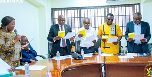 Elizabeth Ofosu-Adjare, Minister of Trade, Agribusiness and Industry, swearing in members of the committee Elizabeth Ofosu-Adjare, Minister of Trade, Agribusiness and Industry, swearing in members of the committee