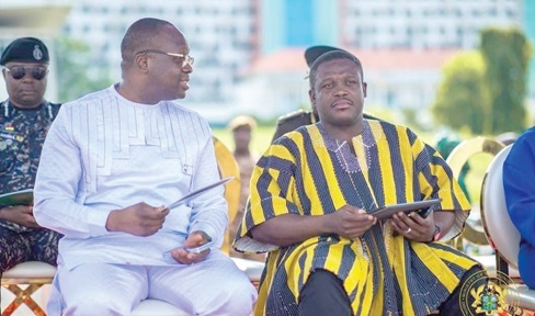 Dr Edward Omane Boamah (left) conferring with Sam Dzata George Dr Edward Omane Boamah (left) conferring with Sam Dzata George