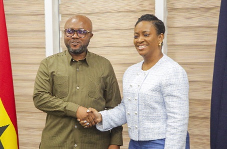 COP Lydia Yaako Donkor (right), Director-General of the Criminal Investigations Department of Police, in a handshake with Divine Selase Agbeti (left), Director-General of the Cyber Security Authority, after the event.  Picture: CALEB VANDERPUYE