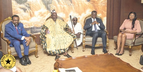 Dr Johnson Asiama (left), Governor, BoG, and his team with the Yagbon Wura Dr Johnson Asiama (left), Governor, BoG, and his team with the Yagbon Wura