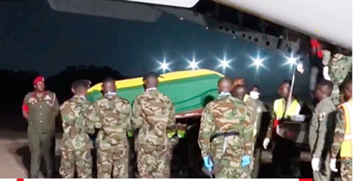 One of the caskets being received at the Airforce Base, Burma Camp