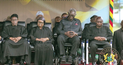 Former President J.A. Kufuor (2nd from right) in the company of Dr Mahamudu Bawumia (right), former Vice-President, and Alban Bagbin (left), Speaker of Parliament, in a solemn mood during the service