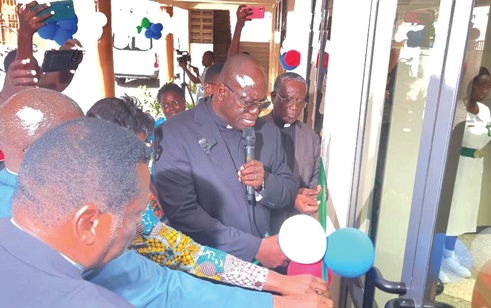 Rt Rev. Dr Abraham Nana Opare Kwakye (2nd from left), Moderator, General Assembly, Presbyterian Church of Ghana (PCG), cutting the tape to open the private health facility. With him are senior clergymen of the PCG