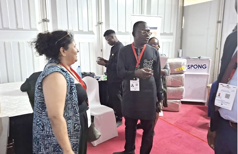 Joseph Siaw Agyepong (2nd from right), Executive Chairman of the Jospong Group of Companies, interacting with some workers of the company at the JGC pavilion at the ongoing DevCon 2025 at Homa Bay in Kenya