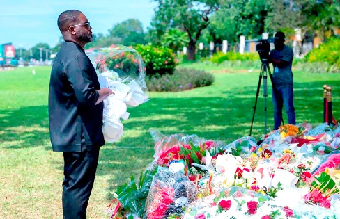 Max Essah Latte, MD, C­argill Ghana Limited, observing a minute’s silence