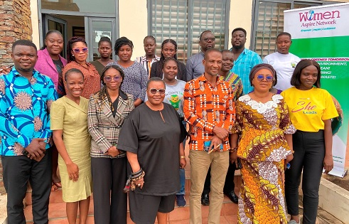 Becky Enyonam Ahadzi (3rd from left), a legal practitioner,  Nana Akrufi VI, Eno hen of Anomabo, Ismail Zagoon-Saeed, the MCE of KEEA,  with some participants after  the event