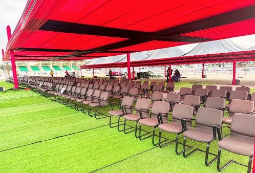 Rows of chairs for dignitaries and invited guests