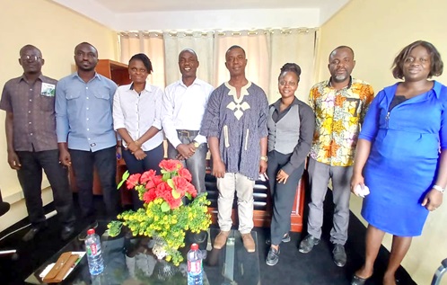 John Asumaning Agyepong (4th from left), Eastern Regional Head of HeFRA, and Stephen Ampem Darko Koranteng (4th from right), Eastern Regional Chairman of GJA, together with staff of HeFRA and other executive members of the association
