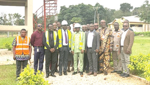 Joseph Addae Akwaboah (3rd from left), Bono Regional Minister, with members of the UENR during the visit to the institution.