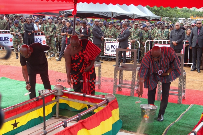 Families throwing sand on the caskets of the fallen patriots as part of the final rites during the burial ceremony. Pictures: ELVIS NII NOI DOWUONA Families throwing sand on the caskets of the fallen patriots as part of the final rites during the burial ceremony. Pictures: ELVIS NII NOI DOWUONA