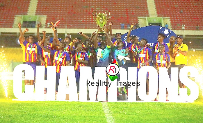 • Hearts of Oak captain, Benjamin Asare, hoists the trophy amid jubilation by his teammates and official yesterday • Hearts of Oak captain, Benjamin Asare, hoists the trophy amid jubilation by his teammates and official yesterday