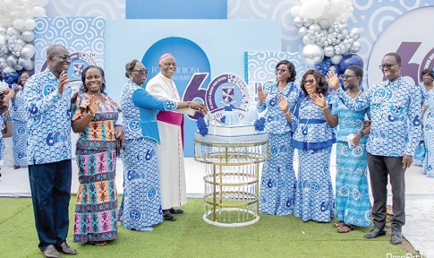 Marian Esi Jackson (4th from right), Headmistress, St Rose’s SHS; Most Rev. Joseph Afrifa-Agyekum (4th from left), Bishop of Koforidua Diocese, and some officials of the school after cutting the anniversary cake Marian Esi Jackson (4th from right), Headmistress, St Rose’s SHS; Most Rev. Joseph Afrifa-Agyekum (4th from left), Bishop of Koforidua Diocese, and some officials of the school after cutting the anniversary cake