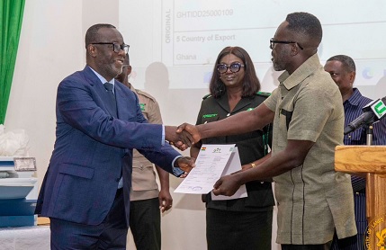 Paul Baffoe-Bonnie (left), acting Chief Justice, presenting the FLEGT Licence Certificate to Richard Nsenkyire (right), General Manager of Samartex Timber and Plywood Co. Ltd Paul Baffoe-Bonnie (left), acting Chief Justice, presenting the FLEGT Licence Certificate to Richard Nsenkyire (right), General Manager of Samartex Timber and Plywood Co. Ltd