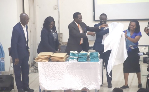 Prof. Samuel Kofi Afrane (middle), Vice-Chancellor, Christian Service University College, being assisted by Prof. David Asamoah (2nd from right), Pro-V.C., KNUST, to unveil a journal of the CSUC in Kumasi. Those with them include Rev. Mary Fosu (2nd from left), Head Pastor, Grace Baptist Church, Amakom. Picture: EMMANUEL BAAH Prof. Samuel Kofi Afrane (middle), Vice-Chancellor, Christian Service University College, being assisted by Prof. David Asamoah (2nd from right), Pro-V.C., KNUST, to unveil a journal of the CSUC in Kumasi. Those with them include Rev. Mary Fosu (2nd from left), Head Pastor, Grace Baptist Church, Amakom. Picture: EMMANUEL BAAH