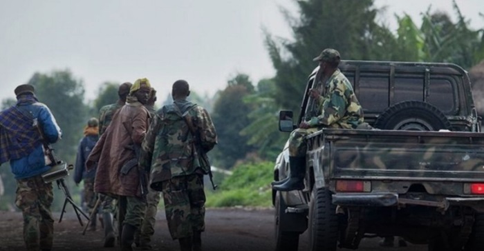 Rebels armed with machetes kill at least 52 in eastern Congo
