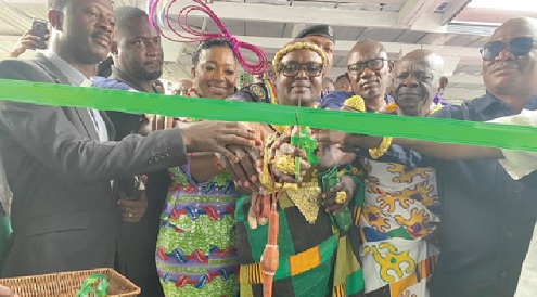 Nana Dr Kwasi Sasu (middle) being assisted by Alexander Akwasi Acquah, Obrempong Gyamfi Saforo Kyereh and Dr Daniren Punguyire to cut the tape to  inaugurate the rehabilitated children’s ward (inset)