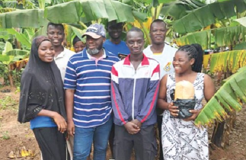 Prof. Alhassan Musah (2nd from left), Dean of Students Affairs, with students at a community farm in the Techiman South District Prof. Alhassan Musah (2nd from left), Dean of Students Affairs, with students at a community farm in the Techiman South District