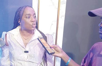 Antoinette Kwofie (left), Chief Finance Officer for MTN Ghana, addressing the media after the empowerment