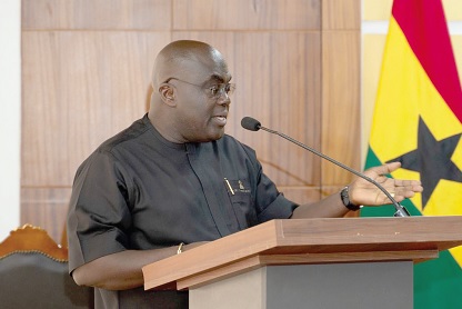 Members of the MiDA board. inset: Julius Debrah, Chief of Staff, speaking at the swearing-in ceremony