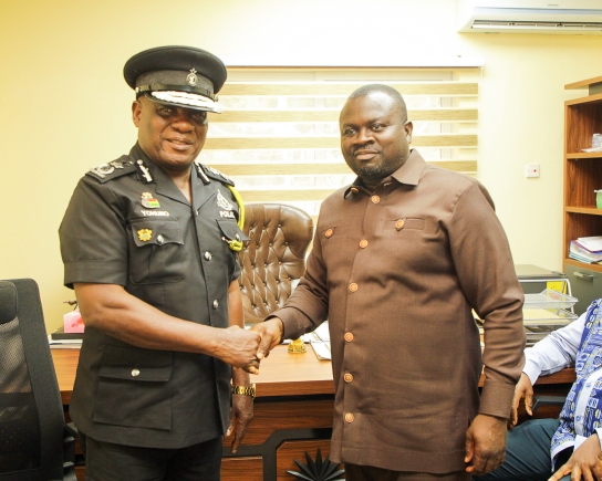 Albert Kwabena Dwumfour, President of GJA,  welcoming Christian Tetteh Yohuno,  Inspector-General of Police, to his office