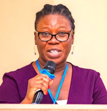 Selina Torisson Saaka (right), Head of the University of Ghana Students Financial Aid Office, addressing the conference