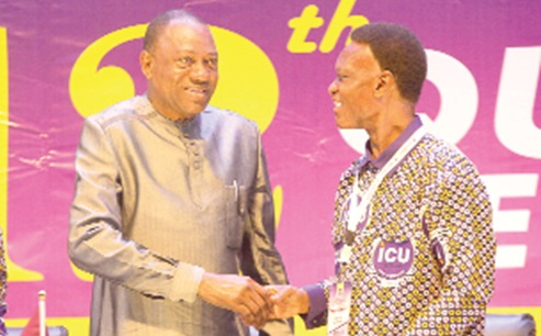Dr Abdul-Rashid Hassan Pelpuo (left), Minister of Labour, Jobs and Employment, in a handshake with Morgan Ayawine, General-Secretary, ICU-Ghana, at the event. Picture: CALEB VANDERPUYE Dr Abdul-Rashid Hassan Pelpuo (left), Minister of Labour, Jobs and Employment, in a handshake with Morgan Ayawine, General-Secretary, ICU-Ghana, at the event. Picture: CALEB VANDERPUYE