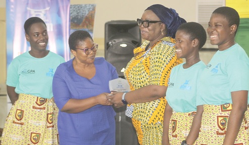 Harriet Adelaide Tagoe (3rd from right), MD, Afram Publications Ltd, presenting the first-place award to Felicia A.A. Bulley (2nd from left), English Teacher, Tema Senior High School, along with the three contestants of the competition. Picture: ESTHER ADJORKOR ADJEI Harriet Adelaide Tagoe (3rd from right), MD, Afram Publications Ltd, presenting the first-place award to Felicia A.A. Bulley (2nd from left), English Teacher, Tema Senior High School, along with the three contestants of the competition. Picture: ESTHER ADJORKOR ADJEI