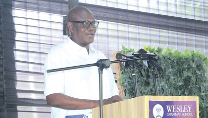 Prosper Bani (left), National Security Advisor to the President, addressing guests and participants in the anniversary launch Prosper Bani (left), National Security Advisor to the President, addressing guests and participants in the anniversary launch