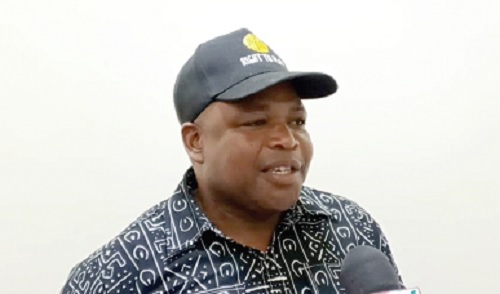 Evans Sinkari (inset), Country Director of Right to Play Ghana, addressing the participants in Koforidua