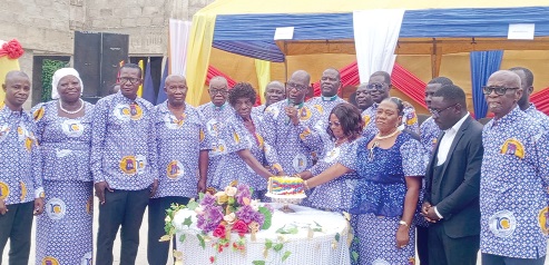 Very Rev. Isaac Aidoo (middle), Superintendent Minister of the Mankessim Circuit of the Methodist Church, cutting the anniversary cake with other dignitaries Very Rev. Isaac Aidoo (middle), Superintendent Minister of the Mankessim Circuit of the Methodist Church, cutting the anniversary cake with other dignitaries