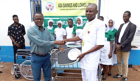 Martin Yenuman Weingam (left), the ASA Area Manager for Tamale North, presenting the equipment to Joseph Yakubu, Head of Administration at the hospital Martin Yenuman Weingam (left), the ASA Area Manager for Tamale North, presenting the equipment to Joseph Yakubu, Head of Administration at the hospital