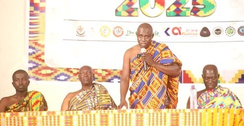 Kwame Nyame (standing), President, Royal Kente Weavers and Sellers Association, speaking at the event in Kumasi, while other executive members of the association look on. Picture: EMMANUEL BAAH
