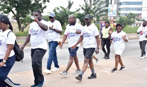 Joyceline Coleman ( right), Partner, KPMG Ghana, Andrew Akoto (2nd from right), Country Manager, KPMG, and some officials of the firm during the walk