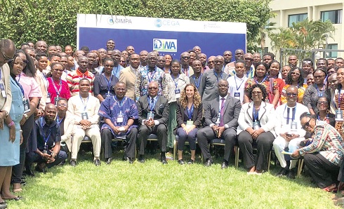 Dr Nii Moi Thompson (arrowed), Chairman, National Development Planning Commission; Prof. Philip Duku Osei (seated 5th from right), former Vice-Chancellor, SDD-UBIDS, with some participants