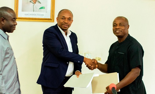 Professor Mawutor (right), Vice-Chancellor, UPSA, exchanging the signed documents with Philip Gamey, Executive Chairman of Hallmark Research Lab. Looking on is Emmanuel Kwadwo Agyekum, Minister of State in Charge of Special Initiatives Professor Mawutor (right), Vice-Chancellor, UPSA, exchanging the signed documents with Philip Gamey, Executive Chairman of Hallmark Research Lab. Looking on is Emmanuel Kwadwo Agyekum, Minister of State in Charge of Special Initiatives