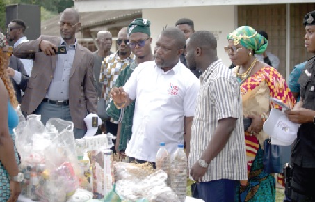 James Gunu (arrowed), Volta Regional Minister, at one of the mini-exhibition stands