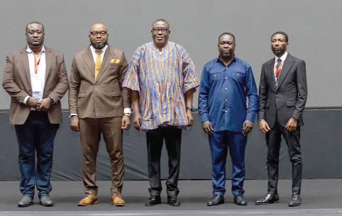 Samuel Ofosu Ampofo (middle), Policy Advisor for Political Affairs at the Office of the Vice-President; Mohammed Adams Sukparu (2nd from left), Deputy Minister of Communication, Digital Technology and Innovations, and Mark-Oliver Kevor (2nd from right), Director-General of NITA, and other dignitaries after the event Samuel Ofosu Ampofo (middle), Policy Advisor for Political Affairs at the Office of the Vice-President; Mohammed Adams Sukparu (2nd from left), Deputy Minister of Communication, Digital Technology and Innovations, and Mark-Oliver Kevor (2nd from right), Director-General of NITA, and other dignitaries after the event