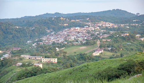 Amedzofe as seen from the peak of Mount Gemi (inset)