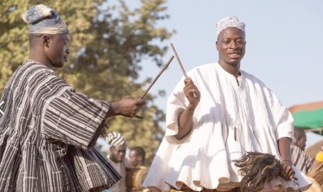 At intervals, takai dancers strike their rods against those of the dancer in front of them