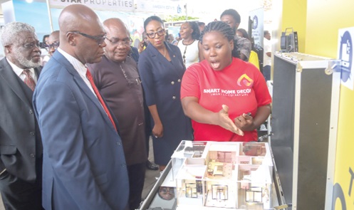 Richeal Naa Quarley Quartey (right), Sales Consultant, Smart Home Decor, explaining a point to Dr James Orleans-Lindsay (2nd from left), President, Ghana Real Estate Developers Association; Samuel Essel (left), Director Finance, GCGL, and some dignitaries during the Daily Graphic-GREDA Home Fair 2025. Pictures: ELVIS NII NOI DOWUONA Richeal Naa Quarley Quartey (right), Sales Consultant, Smart Home Decor, explaining a point to Dr James Orleans-Lindsay (2nd from left), President, Ghana Real Estate Developers Association; Samuel Essel (left), Director Finance, GCGL, and some dignitaries during the Daily Graphic-GREDA Home Fair 2025. Pictures: ELVIS NII NOI DOWUONA